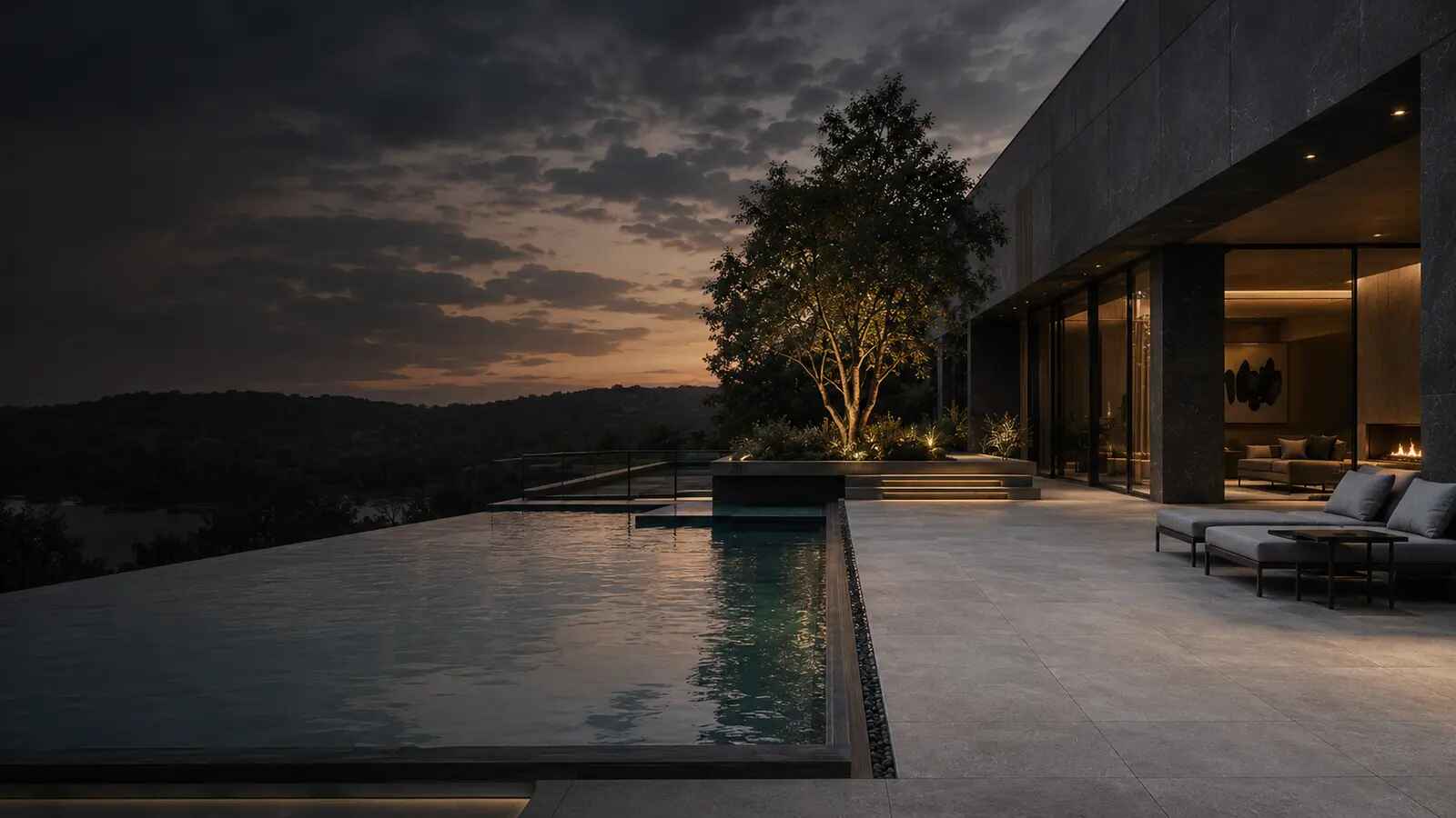 Modern backyard pool deck with Aura Stone porcelain surfaces.