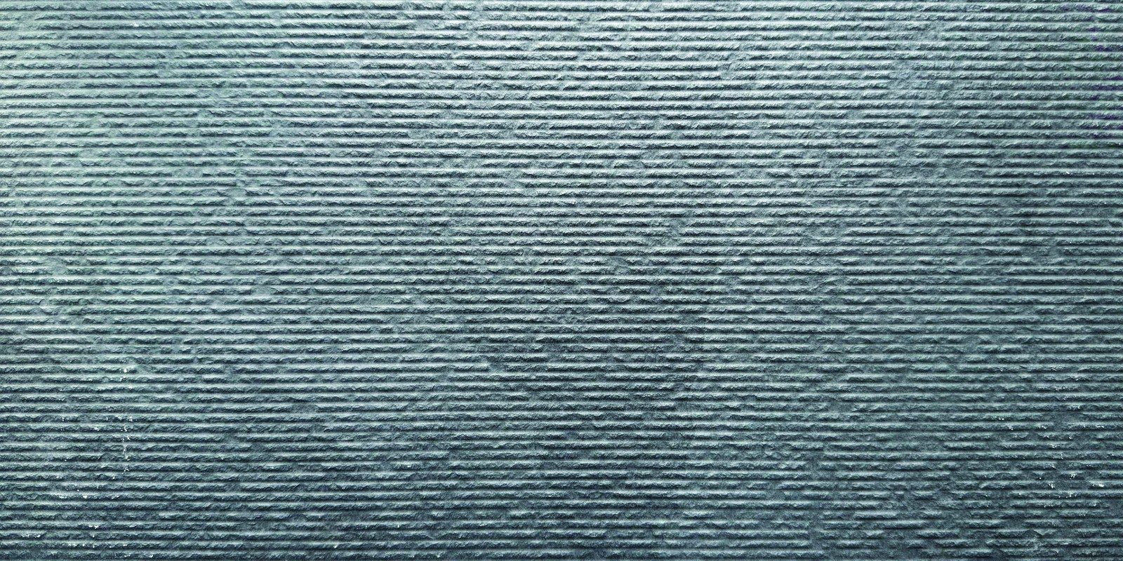 Essence Black porcelain surface texture and color detail.